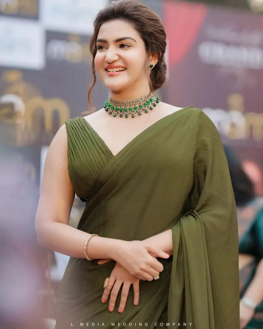 South Indian Girl Honey Rose in Sleeveless Green Saree